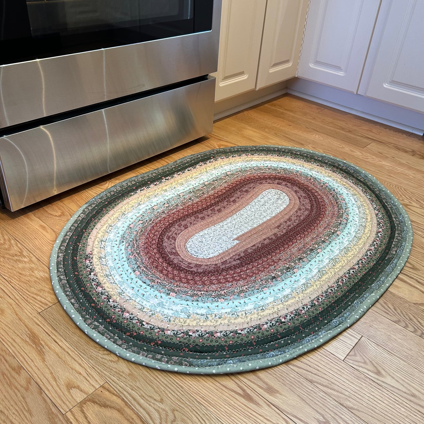 Green and Rose Jelly Roll Rug