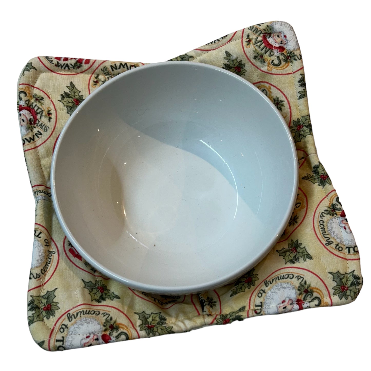 Soup bowl cozy for microwave made with 100% cotton fabric. Featuring vintage Santa and Snowman print fabric and Pellon Wrap and Zap batting. Sewn with cotton thread this Soup Bowl Hug can be used in the Microwave.
