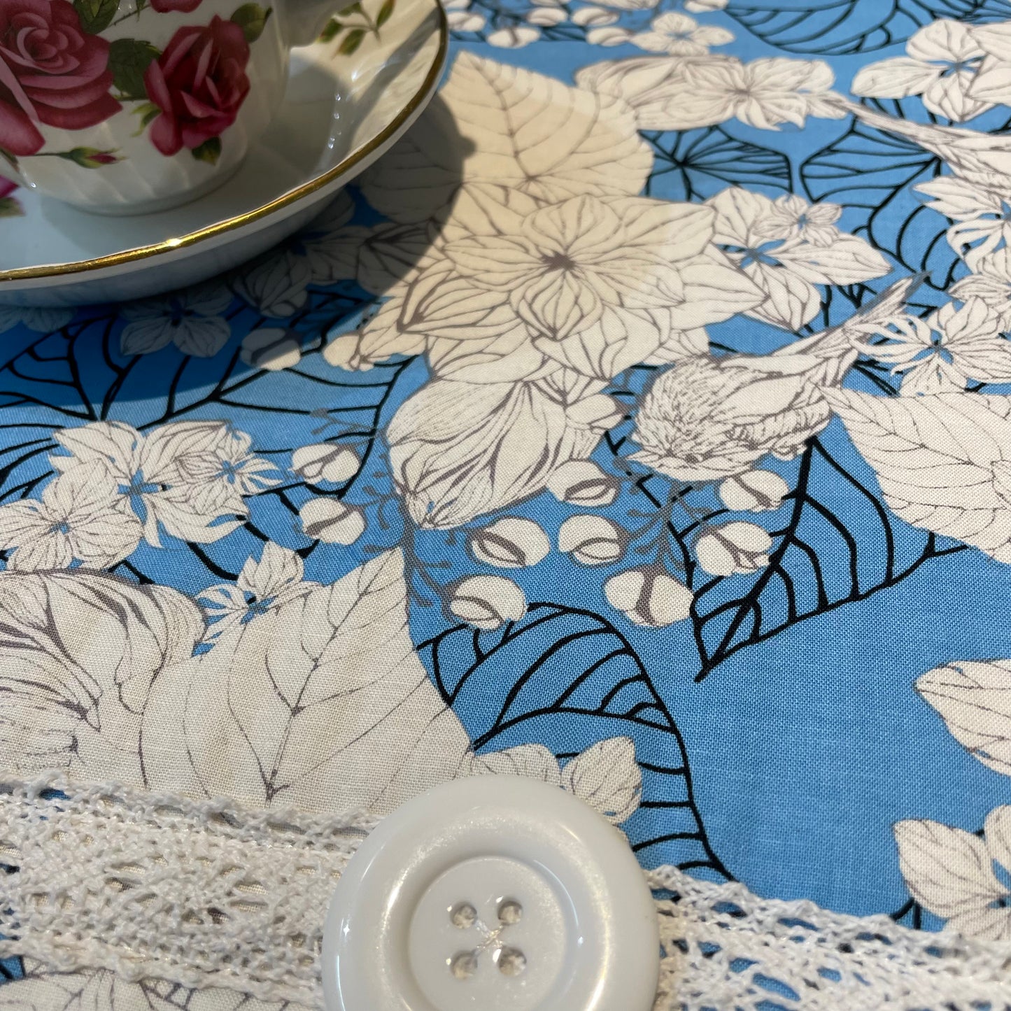 Handmade Pretty Blue Floral Dish Drying Mat with White Cotton Lace Trim and White Accent Button