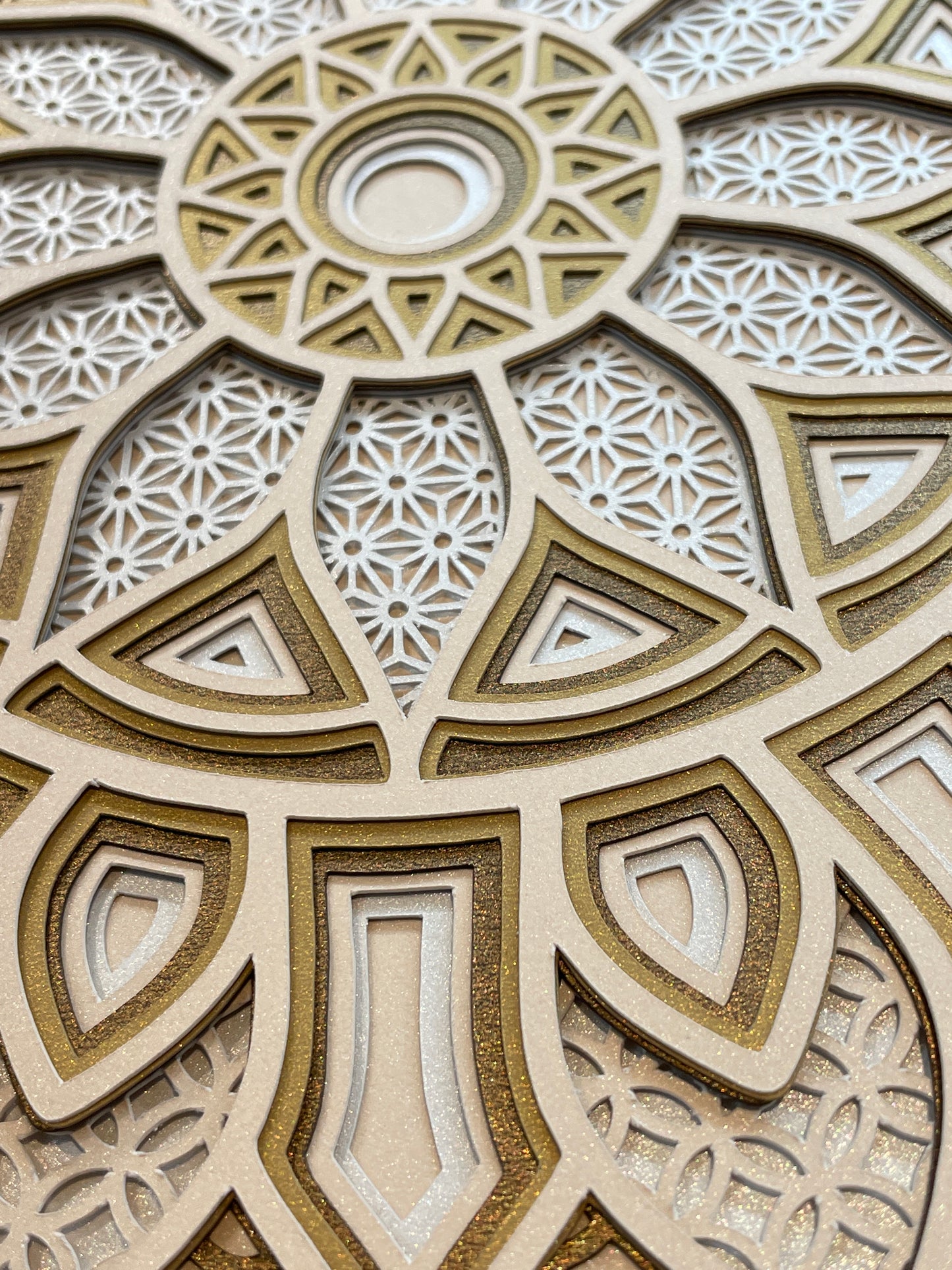 Close up image of 3d layered Mandala design instant download svg files by Home Stitchery Decor. You can make this 3d Layered Mandala for Shadow boxes or separate the layers for all your Cricut Crafting needs. Files can be sized up for CNC or Laser Cut Manadalas