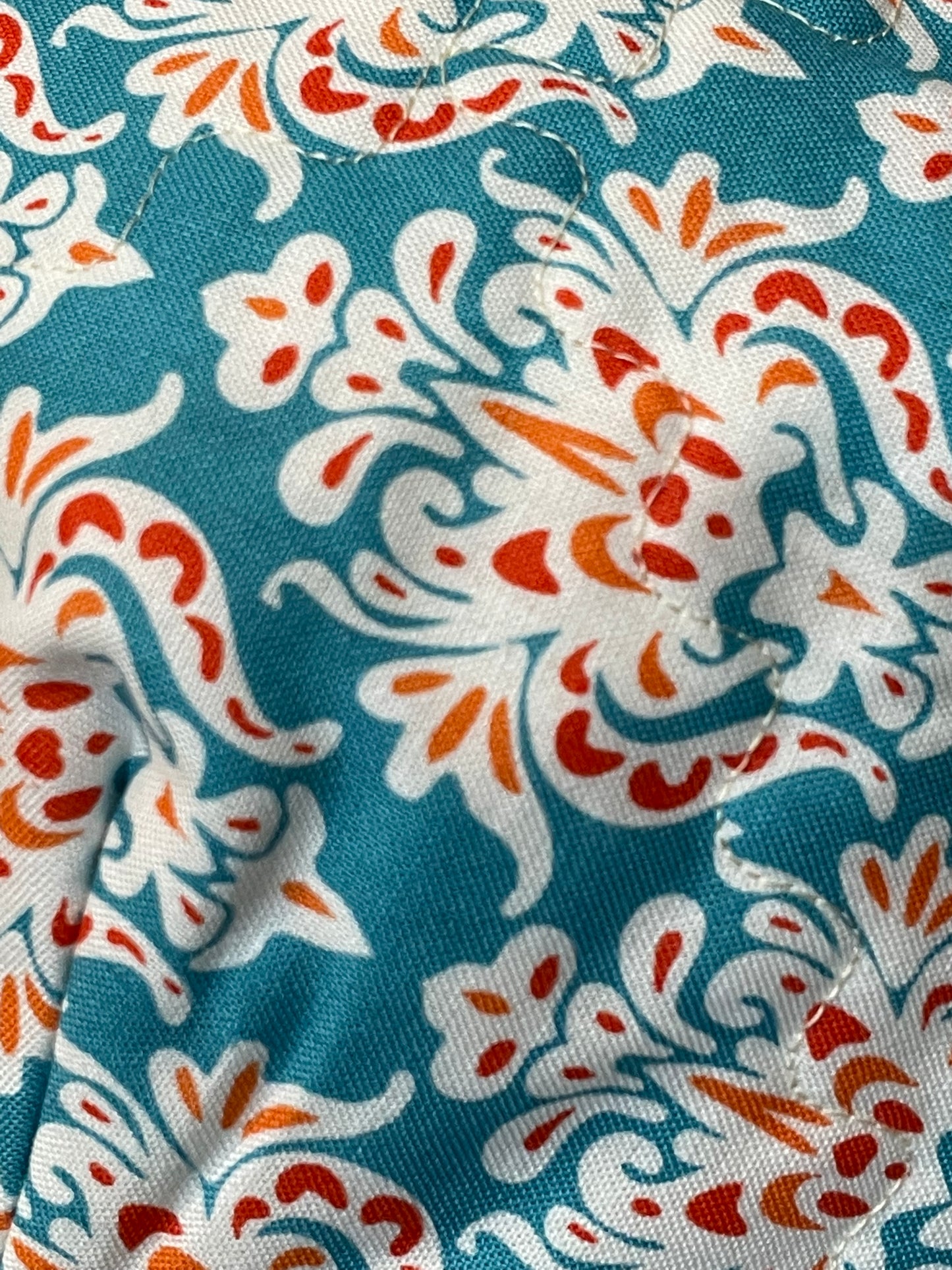 Sewing kit for beginners. Learn to sew a Microwave Soup Bowl Cozy. Featuring orange and teal fabric, cotton thread and Pellon Wrap and Zap batting. Purchase a sewing kit or the finished item from my website. Follow along with complete farmhouse fabulous tutorials on the Home Stitchery Decor YouTube Channel.