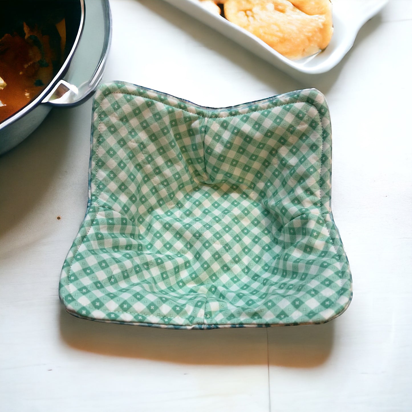 Checkered Kitchen Soup Bowl Cozy for Hot Soup Bowl. Reversible and washable this cute cozy is made with green and blue checkered quilt cotton and Pellon Wrap and Zap Batting.