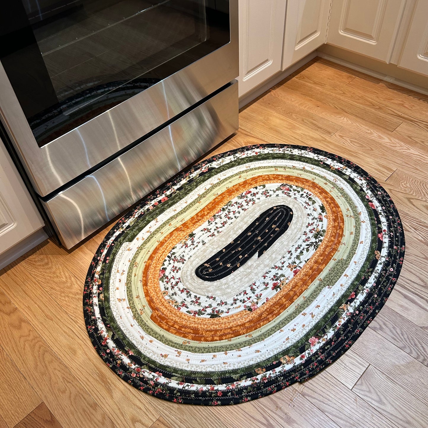 Orange And Black Jelly Roll Rug Handmade In Canada