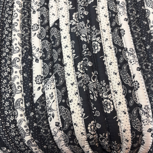 Black rug - new. More coming after Christmas