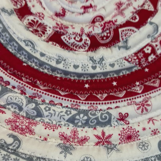 Handmade Christmas Kitchen Rug.  Washable Cotton Jelly Roll Rug for Kitchen, Bedside or Bathmat.  Featuring premium quilt cotton with red, white and grey Christmas prints.  Made in Canada