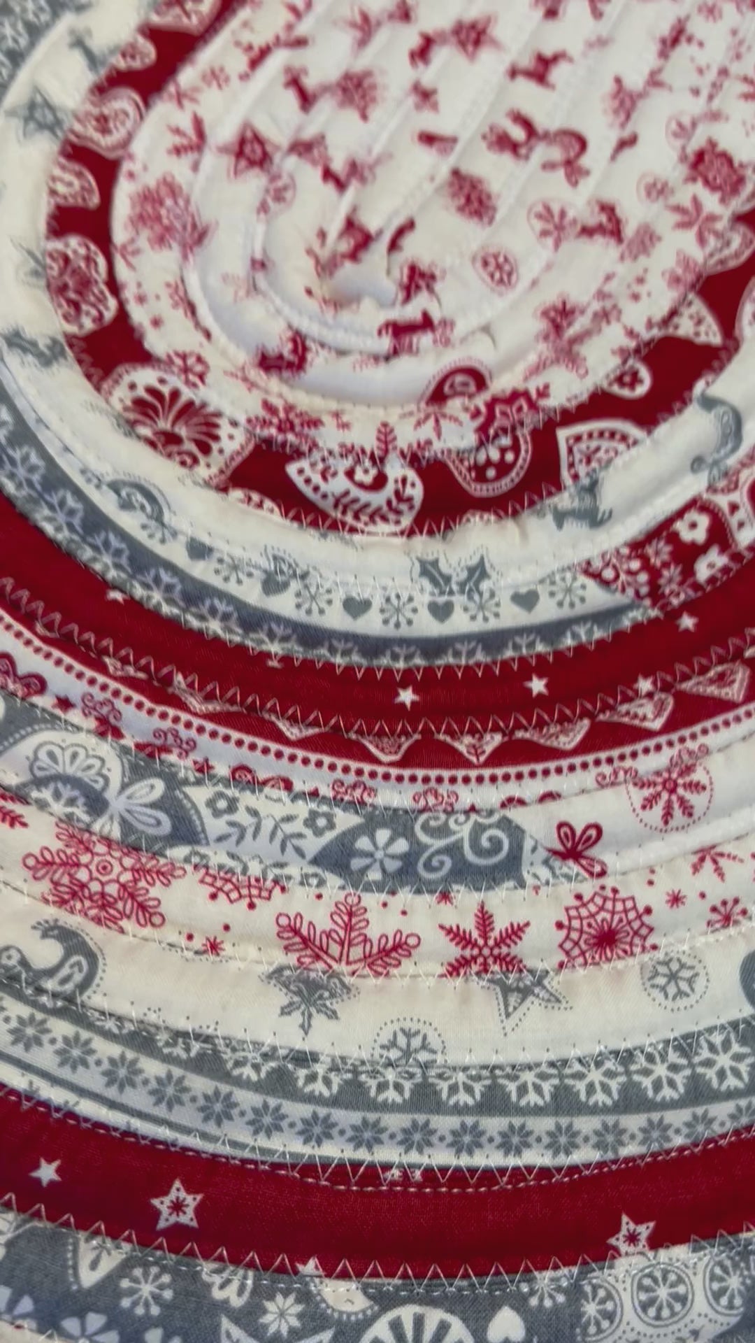 Handmade Christmas Kitchen Rug.  Washable Cotton Jelly Roll Rug for Kitchen, Bedside or Bathmat.  Featuring premium quilt cotton with red, white and grey Christmas prints.  Made in Canada