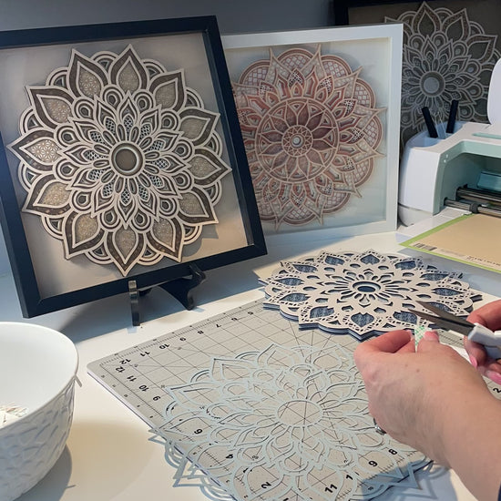 Time lapse video of me assembling a 3d Layered Mandala.  Instant download Mandala SVG designs by Home Stitchery Decor. 