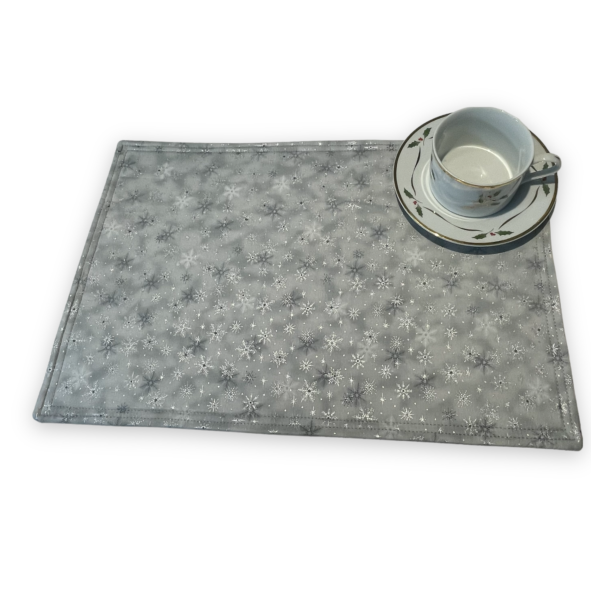 Set of two Christmas Placemats, handmade in Canada Featuring Gold and Cream Christmas Ornaments on one side and Silver Snowflakes on the reverse. Easily dress up your Christmas Kitchen Table with these stylish luxury placemats. Check out all the mix and match decor at Home Stitchery Decor