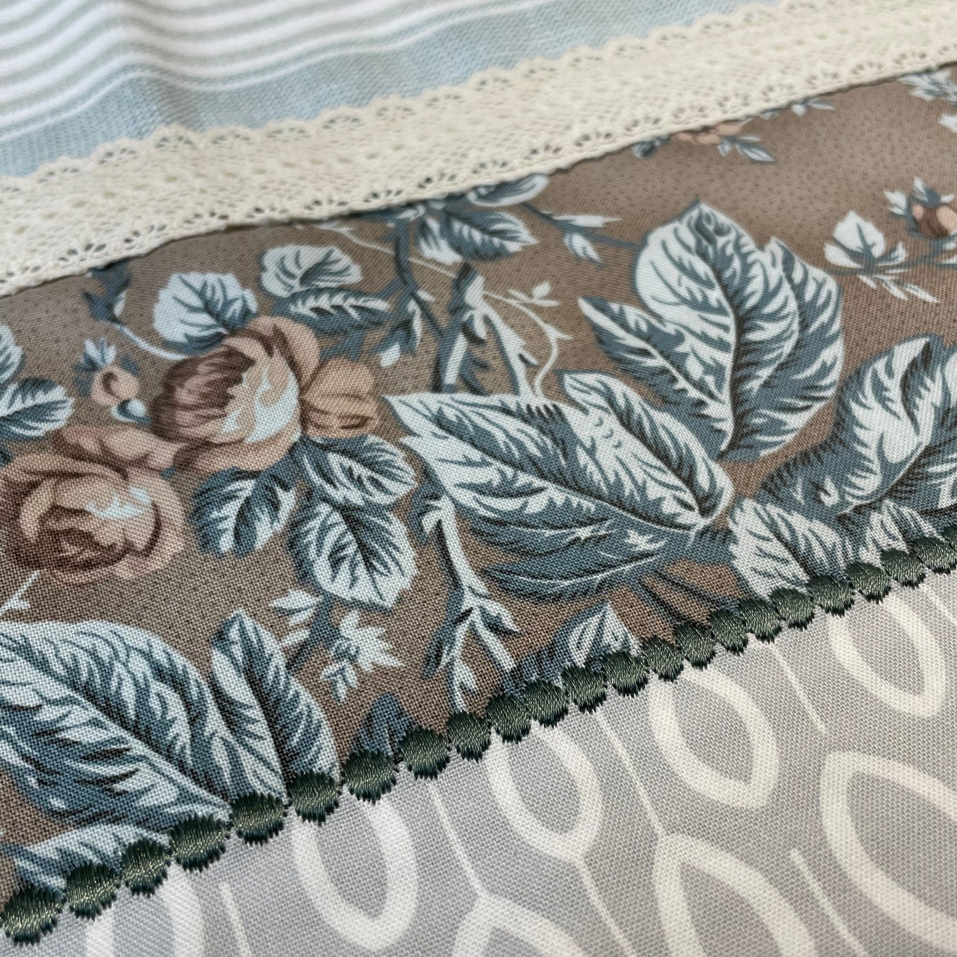 Farmhouse style dish towel. Farmhemian decor made easy with mix and match collections by Home Stitchery Decor. Grey french floral towel with cream cotton lace trim and embroidery stitching. Shop the entire collection or follow along on the Home Stitchery Decor YouTube Channel.