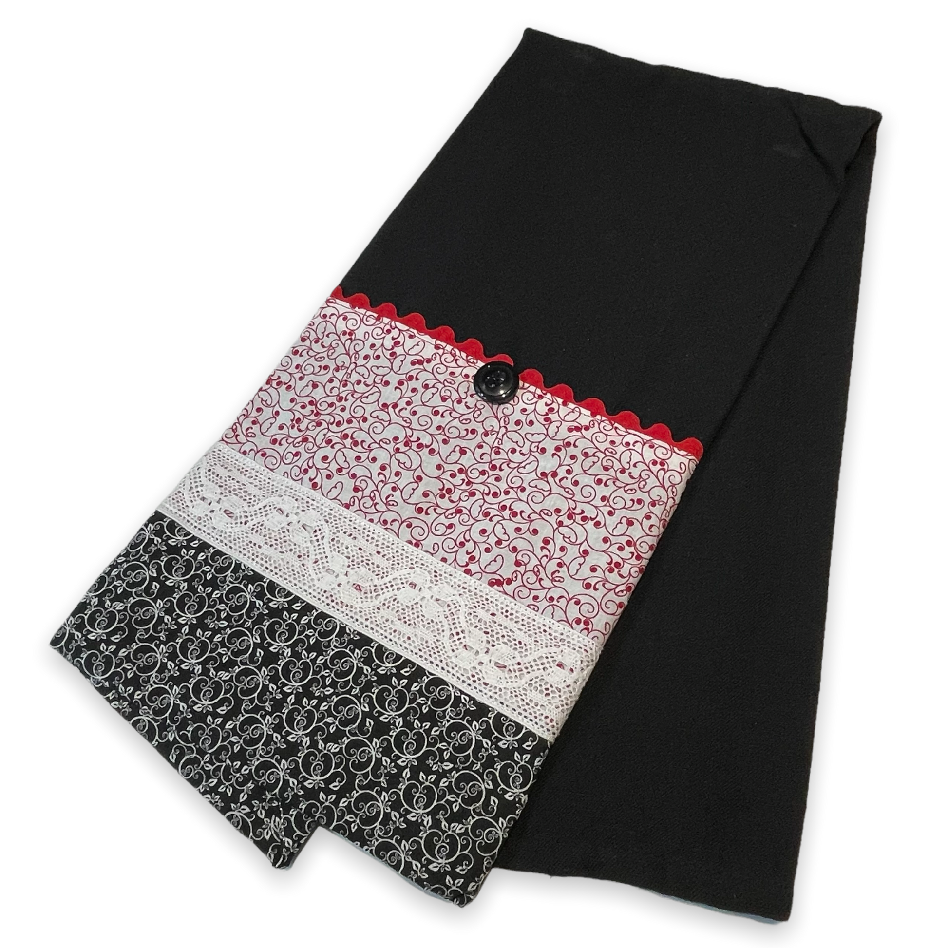 Farmhouse dish towel. Black cotton toweling with quilting cotton accents. Featuring red Ric Rac, wide white polyester lace and button embellishments. Part of a mix and match farmhemian home accents decor line. Browse all the collections online. And be sure to tune into the Home Stitchery Decor YouTube Channel for fabulous fun farmhouse DIY Decor tutorials.