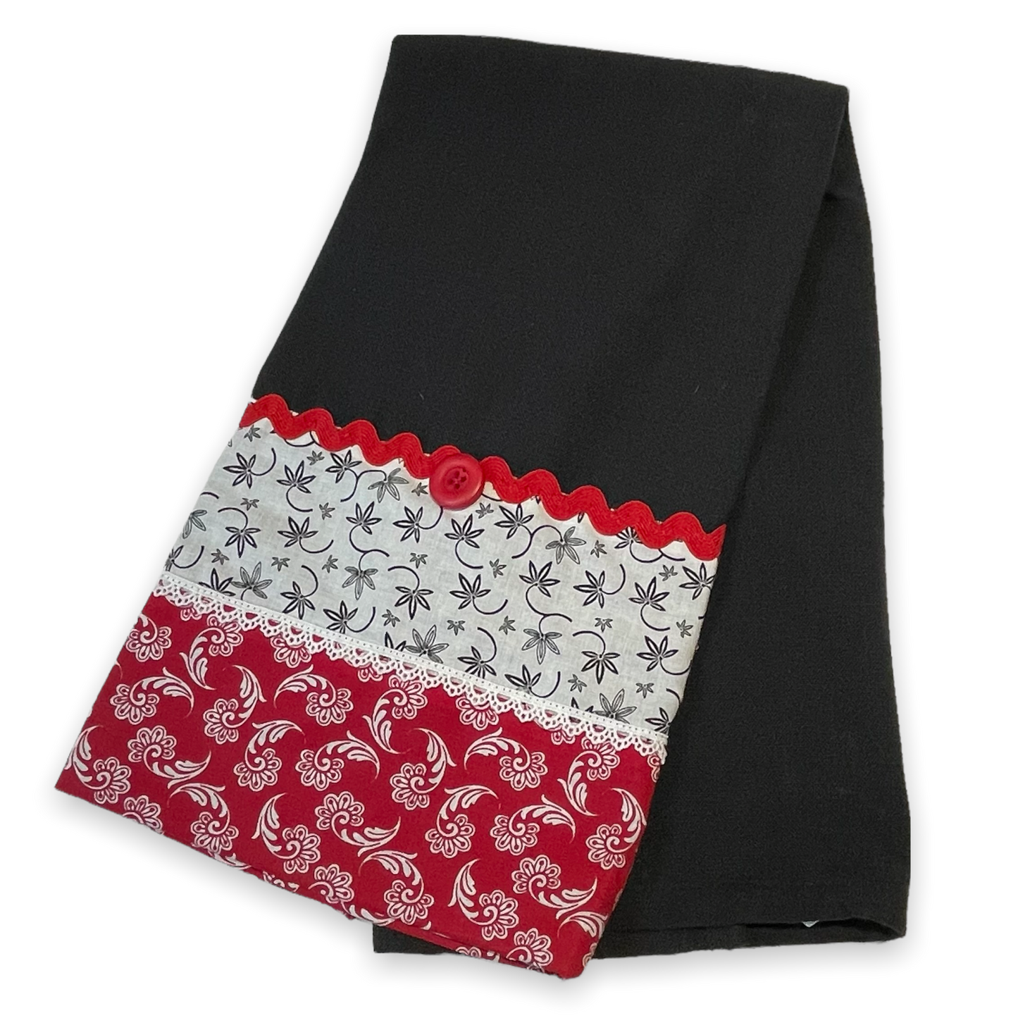 Farmhouse dish towel. Black cotton toweling with quilting cotton accents. Featuring red Ric Rac, white delicatepolyester lace and button embellishments. Part of a mix and match farmhemian home accents decor line. Browse all the collections online. And be sure to tune into the Home Stitchery Decor YouTube Channel for fabulous fun farmhouse DIY Decor tutorials.