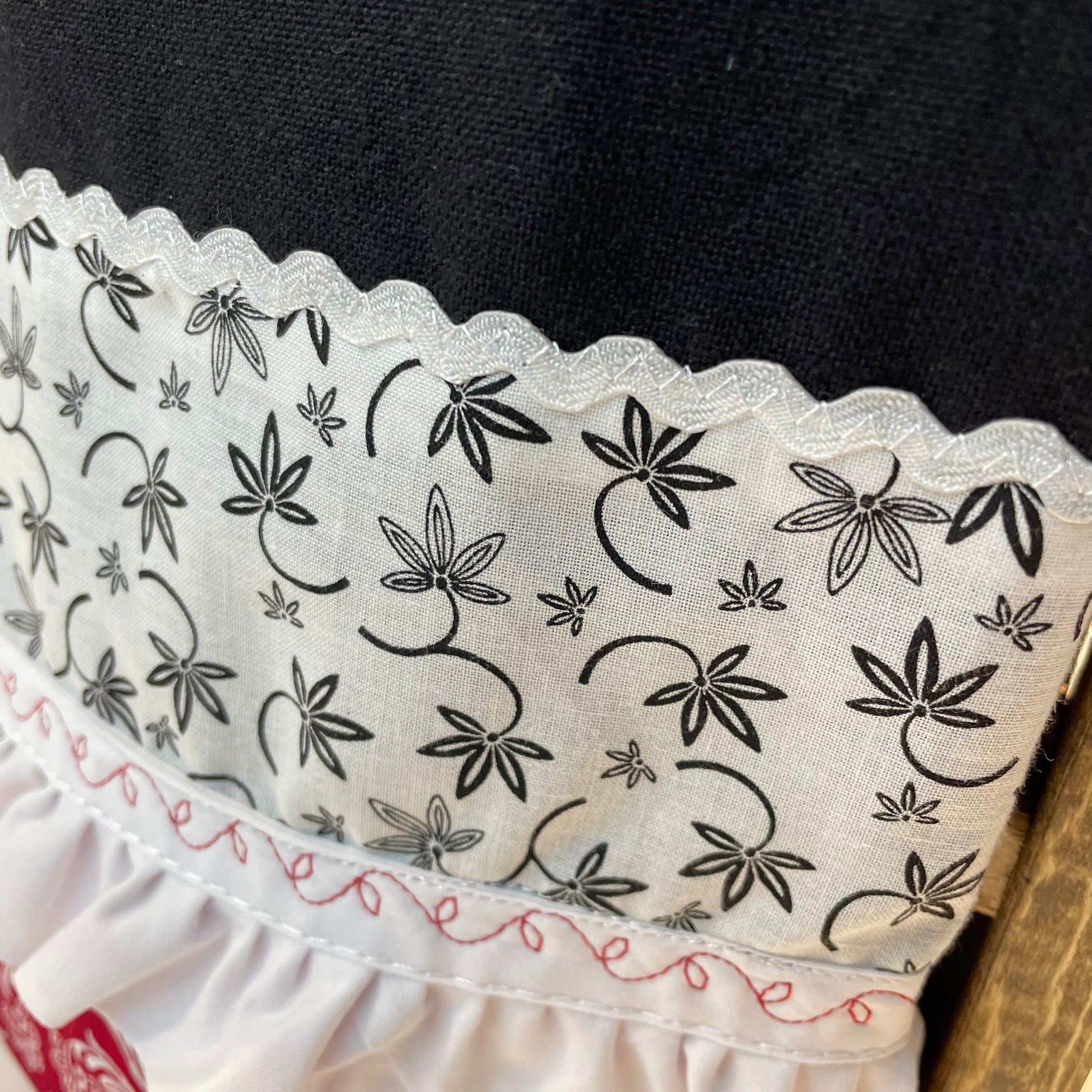 Farmhouse Kitchen Dish Towel featuring black toweling and quilt cotton accents. Embellished with white Ric Rac and Frilled Broadcloth with red embroidery stitching. Part of a collection of mix and match farmhemian styled home decor. Browse the entire collections online. Then head on over to the Home Stitchery Decor YouTube Channel for more Farmhouse DIY Decor fun!