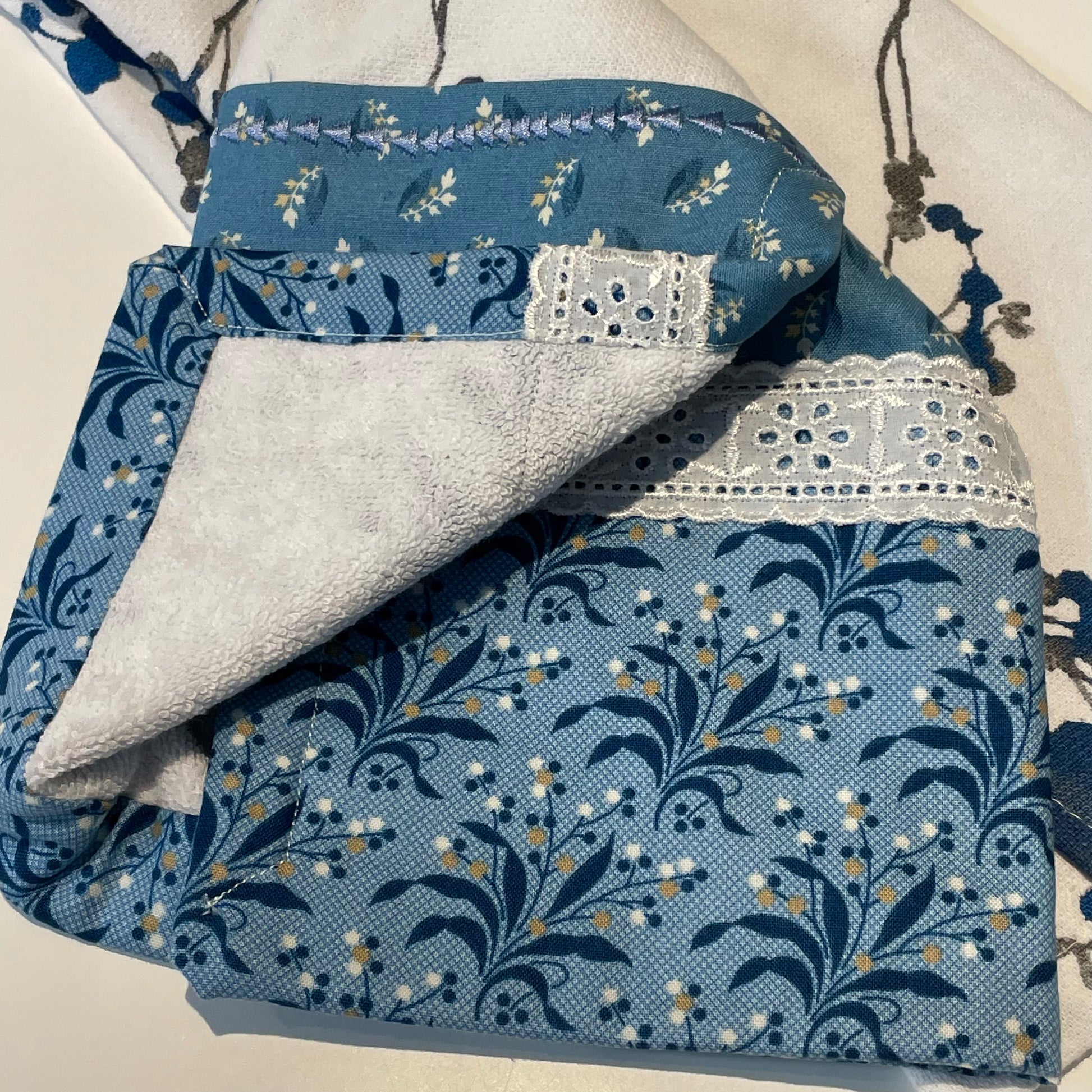Blue and White Handmade Modern Farmhouse Tea Towel. Part of a mix and match collection of coordinating farmhouse home decor. Check it out at Home Stitchery Decor and be sure to check out the Home Stitchery Decor YouTube Channel