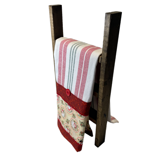 Retro Santas and Snowmen adorn this red Christmas Tea Towel. Handcrafted in Canada. Part of a mix and match collection of home decor. Shop the look at Home Stitchery Decor.