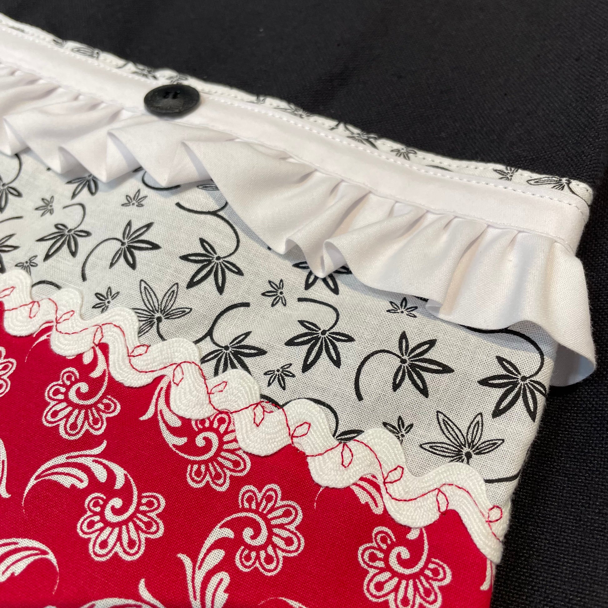 Modern Farmhouse Dish Towel. Black cotton toweling with red white and black quilting cotton accents. Featuring frilled broadcloth, Ric Rac, embroidery stitching and a button. Part of a mix and match collection of handcrafted modern farmhouse decor. Browse your favorites and follow along on the Home Stitchery Decor YouTube Channel.