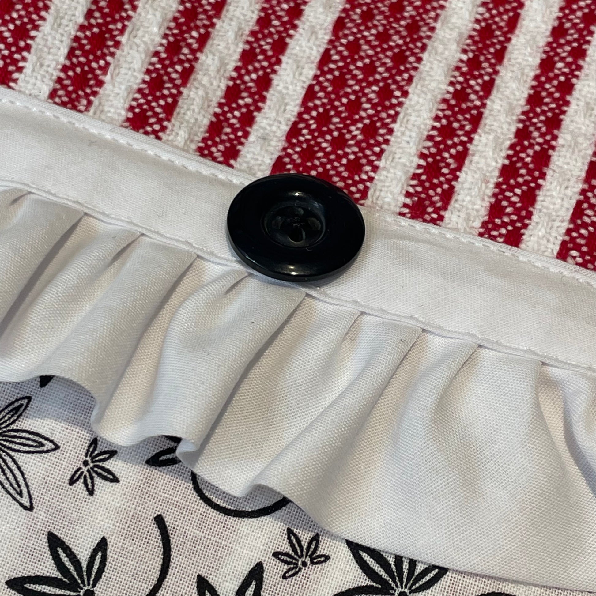 Red and white country style dish towel. Featuring red and white checked toweling; red white and black quilt cotton accents and white cotton lace trim and a double button embellishment. Part of a mix and match collection of coordinated farmhouse fabulous decor. Browse the collections and be sure to check out the Home Stitchery Decor YouTube Channel.