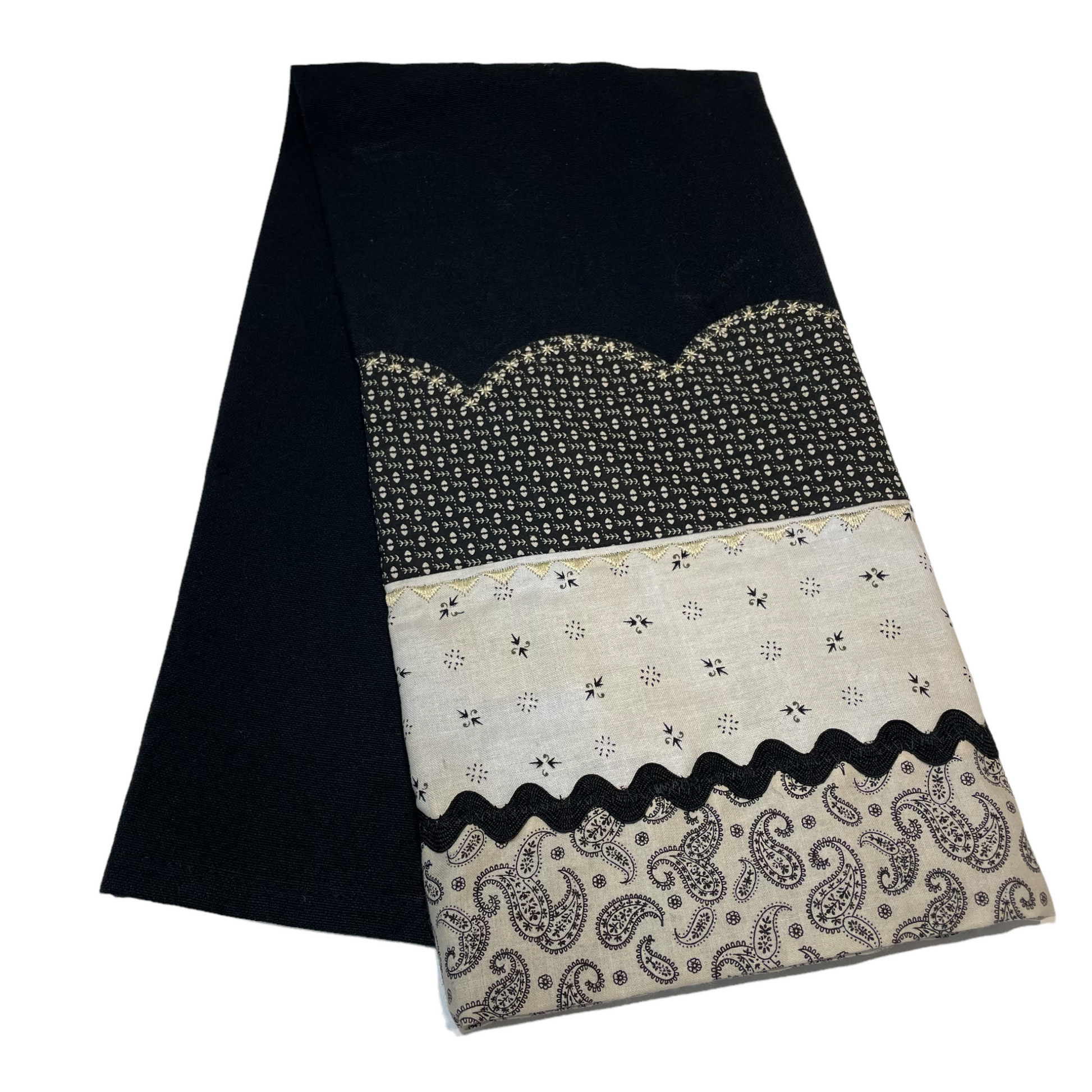 Black kitchen towel with cottage core style details. Black and cream quilt cotton accent fabric with Ric Rac and Embroidery Stitching. Part of a collection of coordinated farmhouse style linens. Shop the look on the website, find me in a local store or Farmers Market. Or follow along on the Home Stitchery Decor YouTube Channel tutorials for fabulous farmhouse style diy decor. And  SVG Mandala Patterns. 