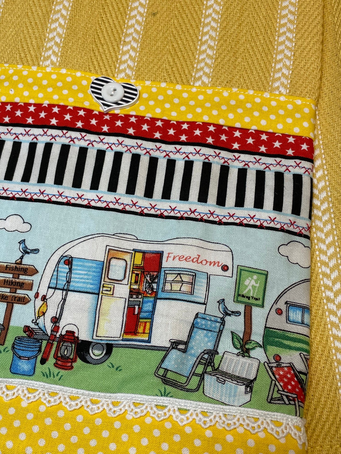 Glaming Decor Idea. Dress up your RV, Travel Trailer or Cabin with cute dish towles featuring retro campers. Yellow and white striped towel with red, white and black details. Handcrafted in Canada. Part of a collection of coordinating decor items. Shop the entire collection online. Find me at a local Farmers Market or follow along on the Home Stitchery Decor YouTube Channel. 