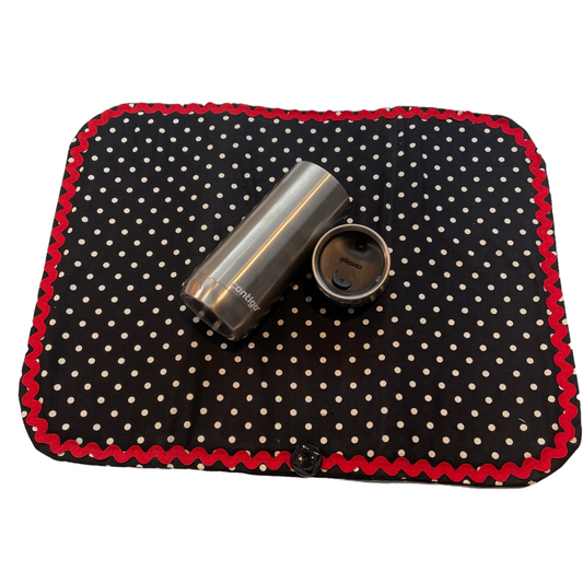Retro Black and White Polka Dot Dish Drying Mat with Red and white trim and a black accent button. Vintage style kitchen decor for 21st century. Part of a mix and match collection so be sure to check out all the coordinating products. Handcrafted in Canada. Find out more on the Home Stitchery Decor YouTube Channel