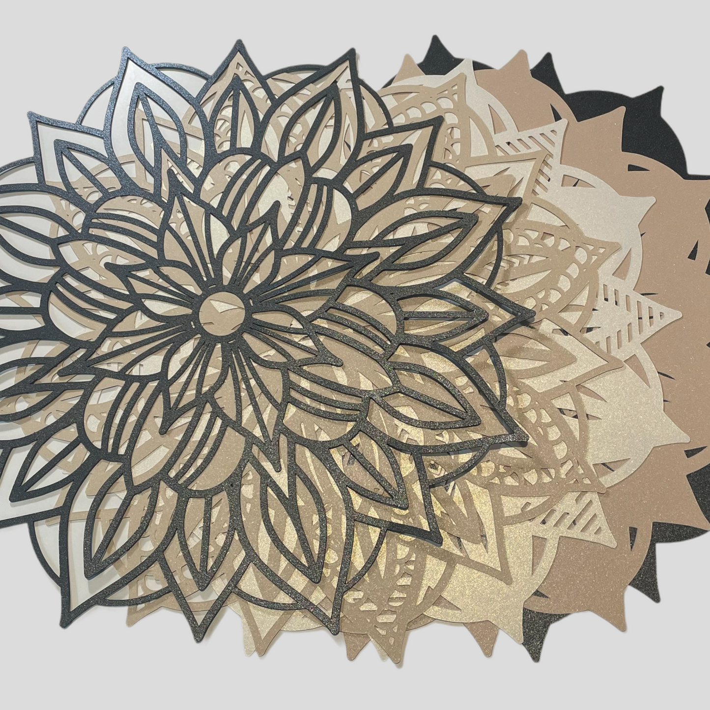 3d layered mandala sections.  Each layered of this 3d Mandala lays perfectly on top of the one under it and the design layers details on top of one another. Follow along with the complete step-by-step tutorial after you purchase this 3d layered Mandala for Cricut.  Files can be sized up for Laser cut Mandala Decor