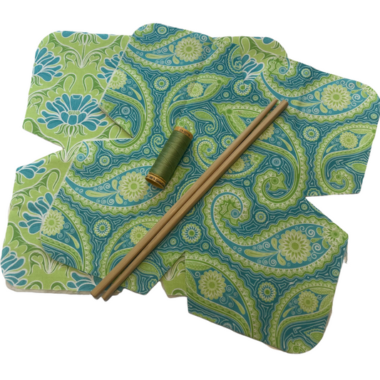 Easy beginner Microwave Soup Bowl Cozy Sewing Kit. Green and Teal Soup Cozy Bowl Sewing Kit. Part of a collection of mix and match decor and kits.  Shop your favorite kits and completed projects also for sale. Farmhouse decor from Home Stitchery Decor. Follow along on the Home Stitchery Decor YouTube Channel.