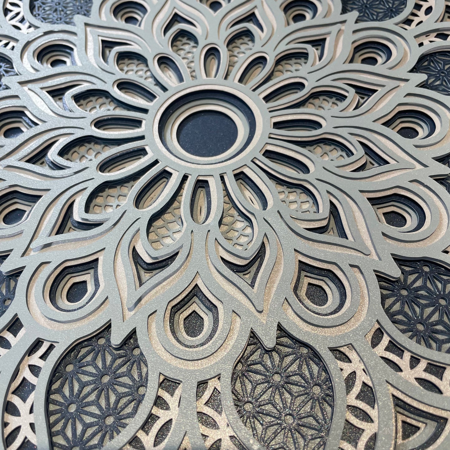 Close up view of 3d Layered Mandala Design.  Instant download svg files for Cricut or Silhouette.  Layered Mandala design can be resized up for larger laser cut Mandalas. Find your favorite layered 3d Mandalas at Home Stitchery Decor