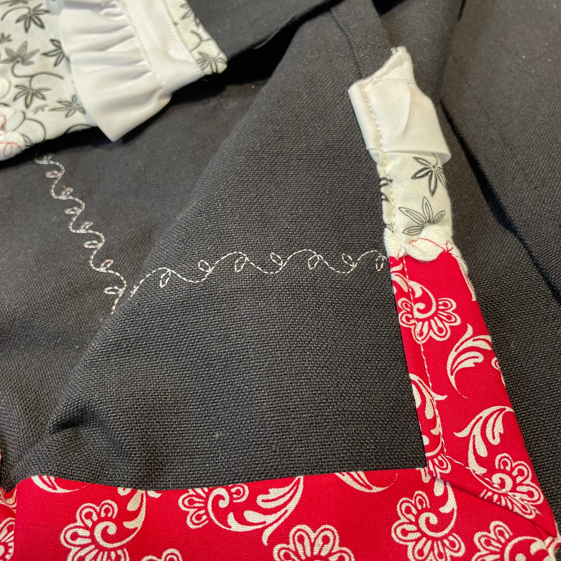Modern Farmhouse Dish Towel. Black cotton toweling with red white and black quilting cotton accents. Featuring frilled broadcloth, Ric Rac, embroidery stitching and a button. Part of a mix and match collection of handcrafted modern farmhouse decor. Browse your favorites and follow along on the Home Stitchery Decor YouTube Channel.