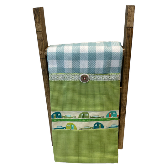 White and Teal Checked Kitchen Dish Towel with cute retro boler trailers, white and green trim and button.  A perfect gift for the glamper in your life.  Find this and coordinating products on the website.  Or follow along on the Home Stitchery Decor YouTube channel, featuring sewing and Cricut tutorials.