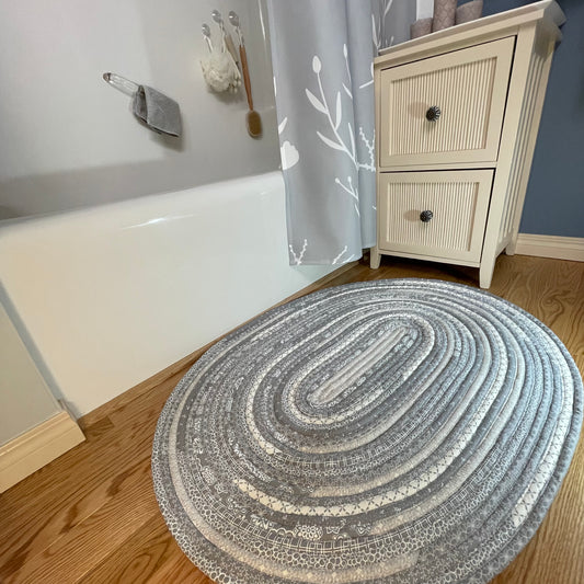 Grey and White Modern Farmhouse Kitchen Accent Rug. Can be used as a luxury bathmat, or bedside rug. Washable, Cotton and made in Canada with globally sourced supplies. Matching dish towels and shower curtains also available. Check out the Home Stitchery Decor YouTube Channel.