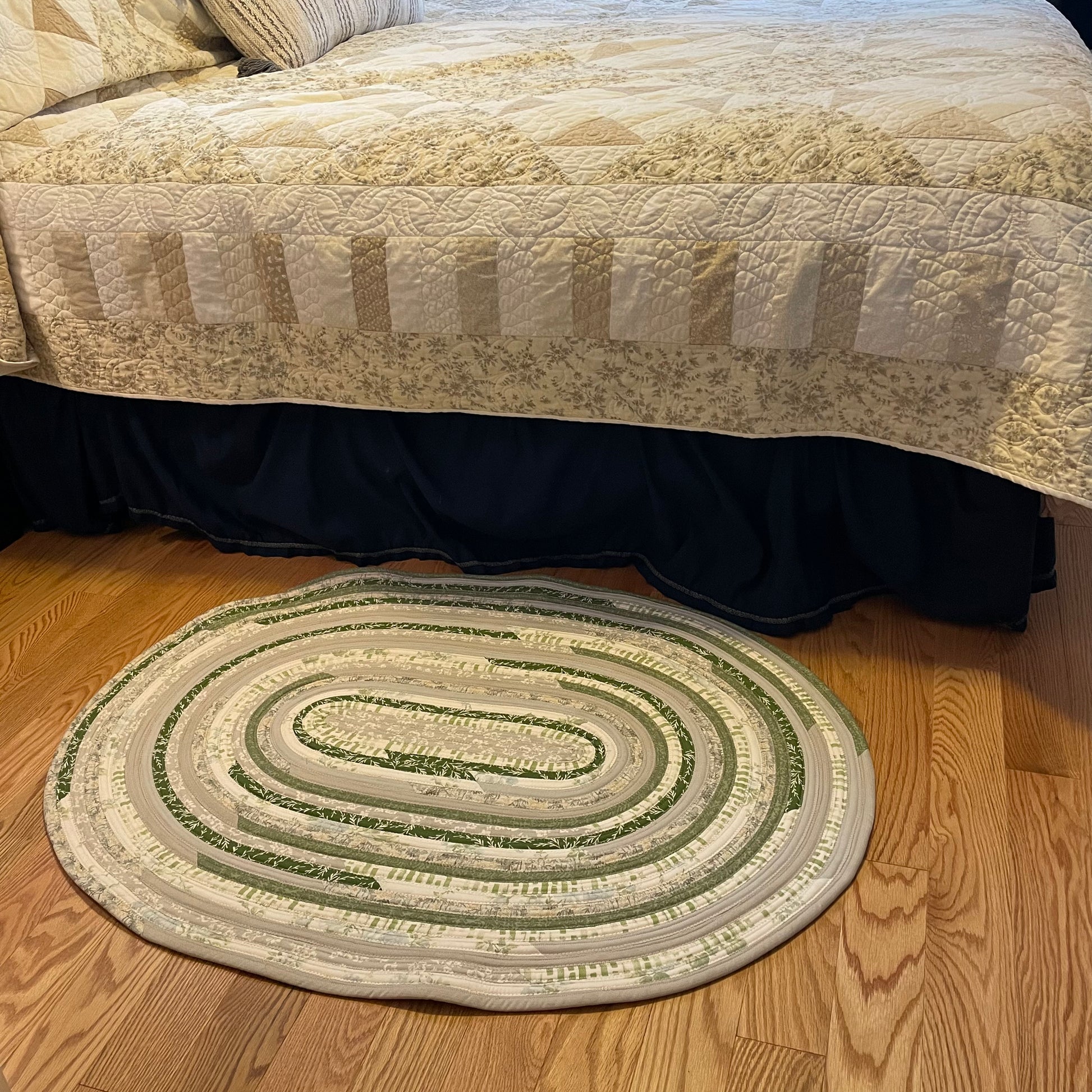 Green and grey cotton kitchen, bedside or bathmat accent rug.  Washable and handcrafted exclusively by Home Stitchery Decor.  Part of a mix and match collection. Features high quality quilting cotton exterior and Pellon Batting fill.  One of a kind.