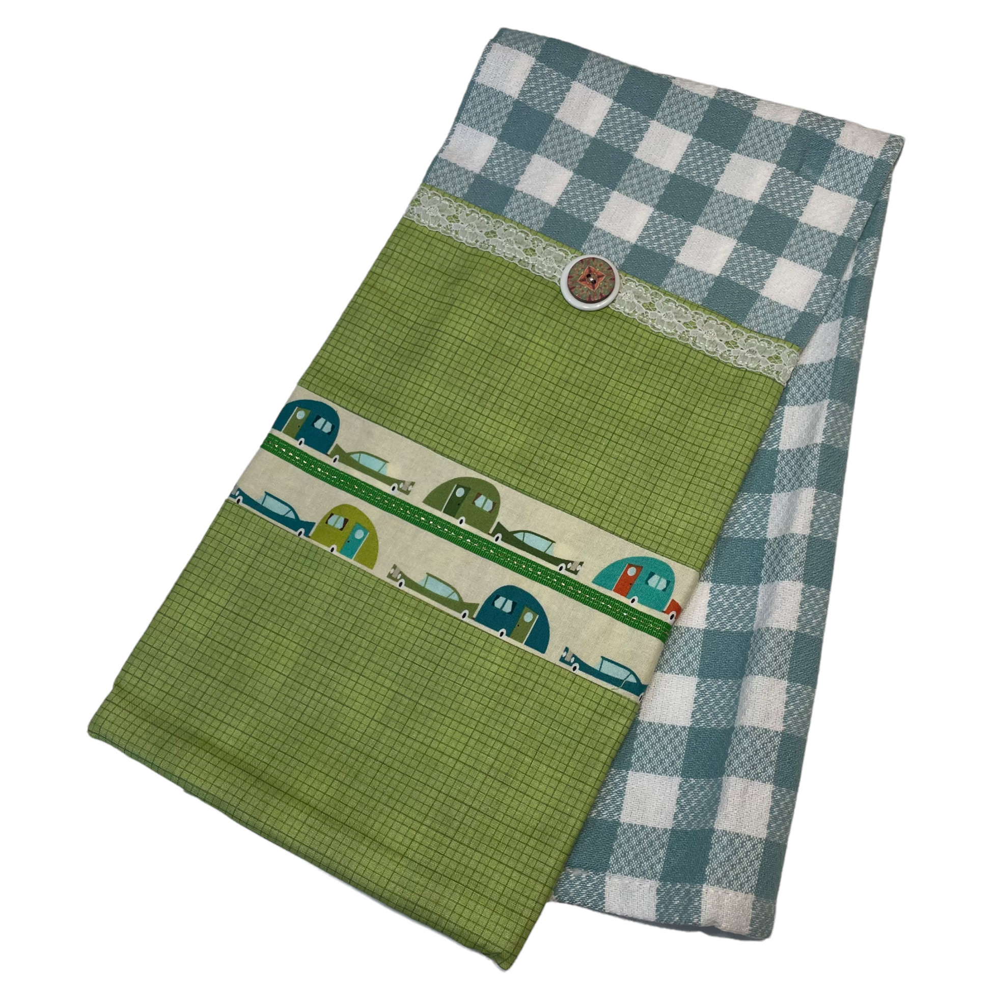 White and Teal Checked Kitchen Dish Towel with cute retro boler trailers, white and green trim and button. A perfect gift for the glamper in your life. Find this and coordinating products on the website. Or follow along on the Home Stitchery Decor YouTube channel, featuring sewing and Cricut tutorials.