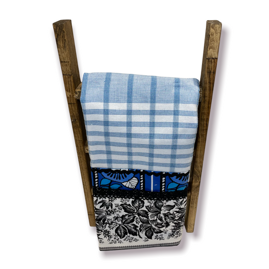 Blue and White Check Dish Towel with blue and black cotton fabric embellishments.  Black cotton Lace and RicRac trim.  Add a pop of color to your kitchen with towels handcrafted by Home Stitchery Decor.  Or learn to make your own with tutorials on the Home Stitchery Decor YouTube Channel. 