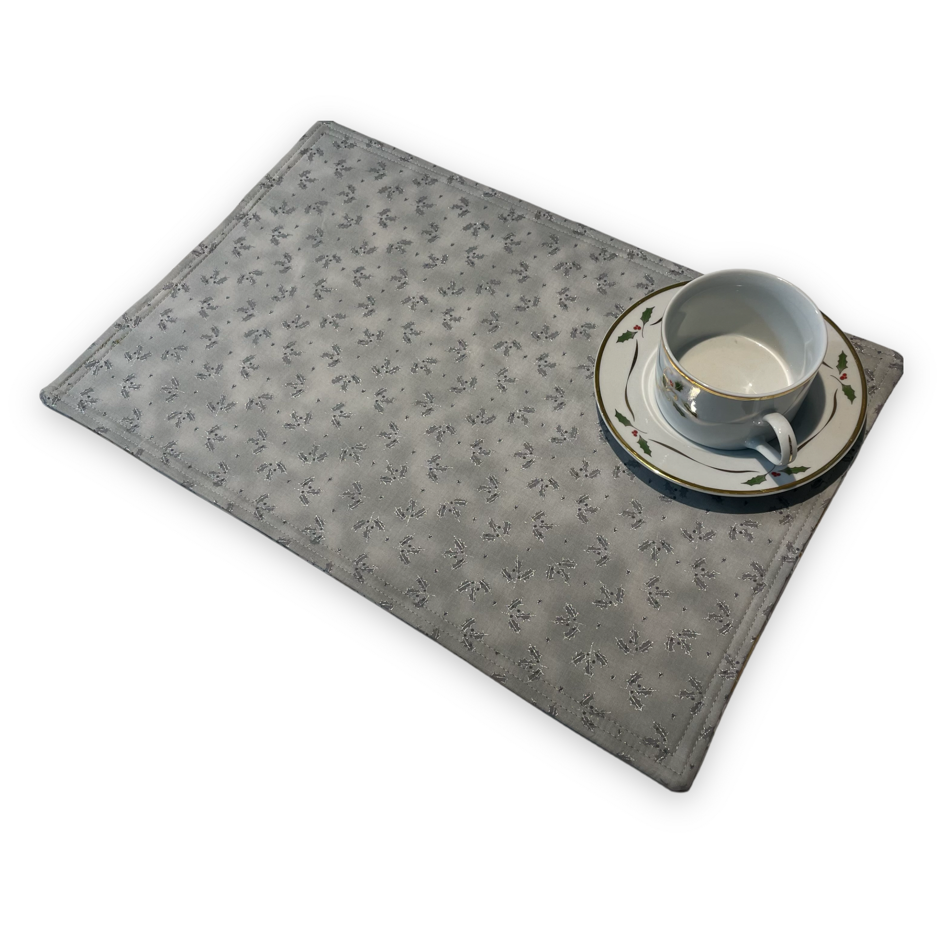 Set of two Christmas Placemats, handmade in Canada Featuring Gold and Cream Christmas Ornaments on one side and Silver Snowflakes on the reverse. Easily dress up your Christmas Kitchen Table with these stylish luxury placemats. Check out all the mix and match decor at Home Stitchery Decor